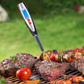 Barbecue fork with thermometer